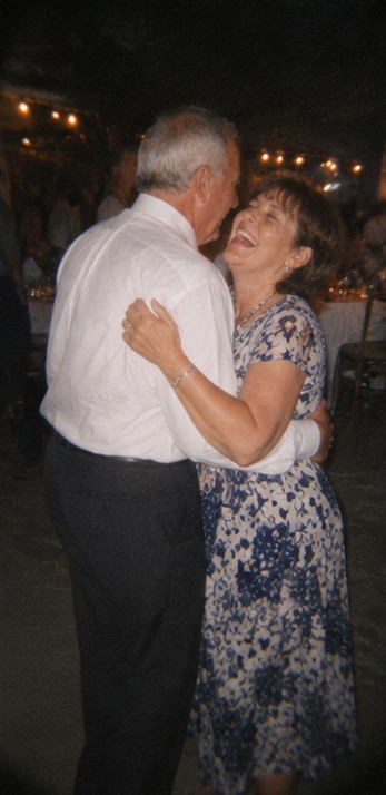 Guests dancing under low light
